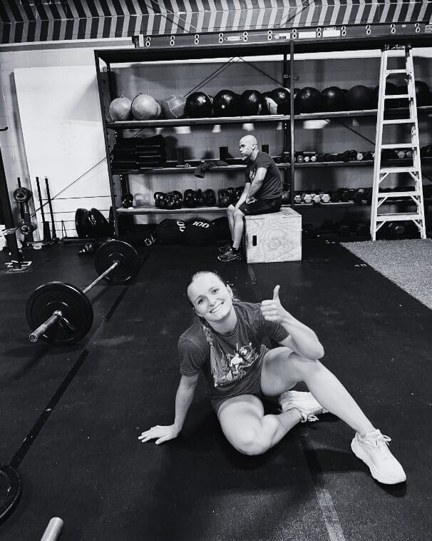 Person performing a scaled CrossFit movement during a deload week at 321 Wellness in Grand Haven