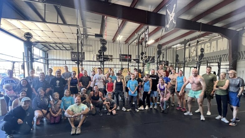 321 Wellness members recovering after the Murph workout with sports massage, IV hydration, and sauna therapy